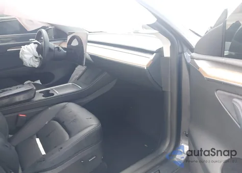 2023 Tesla Model Y z USA, uszkodzony, nr VIN 7SAYGAEE1PF968969